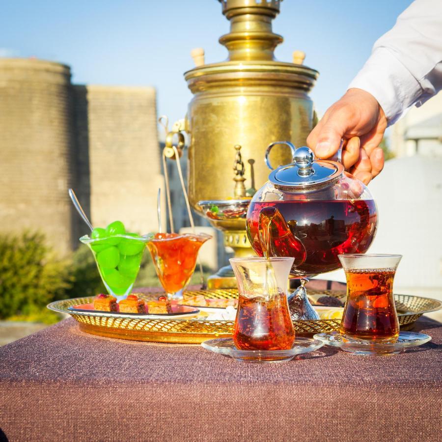 Promenade Hotel Baku Exterior photo Tea in traditional glasses